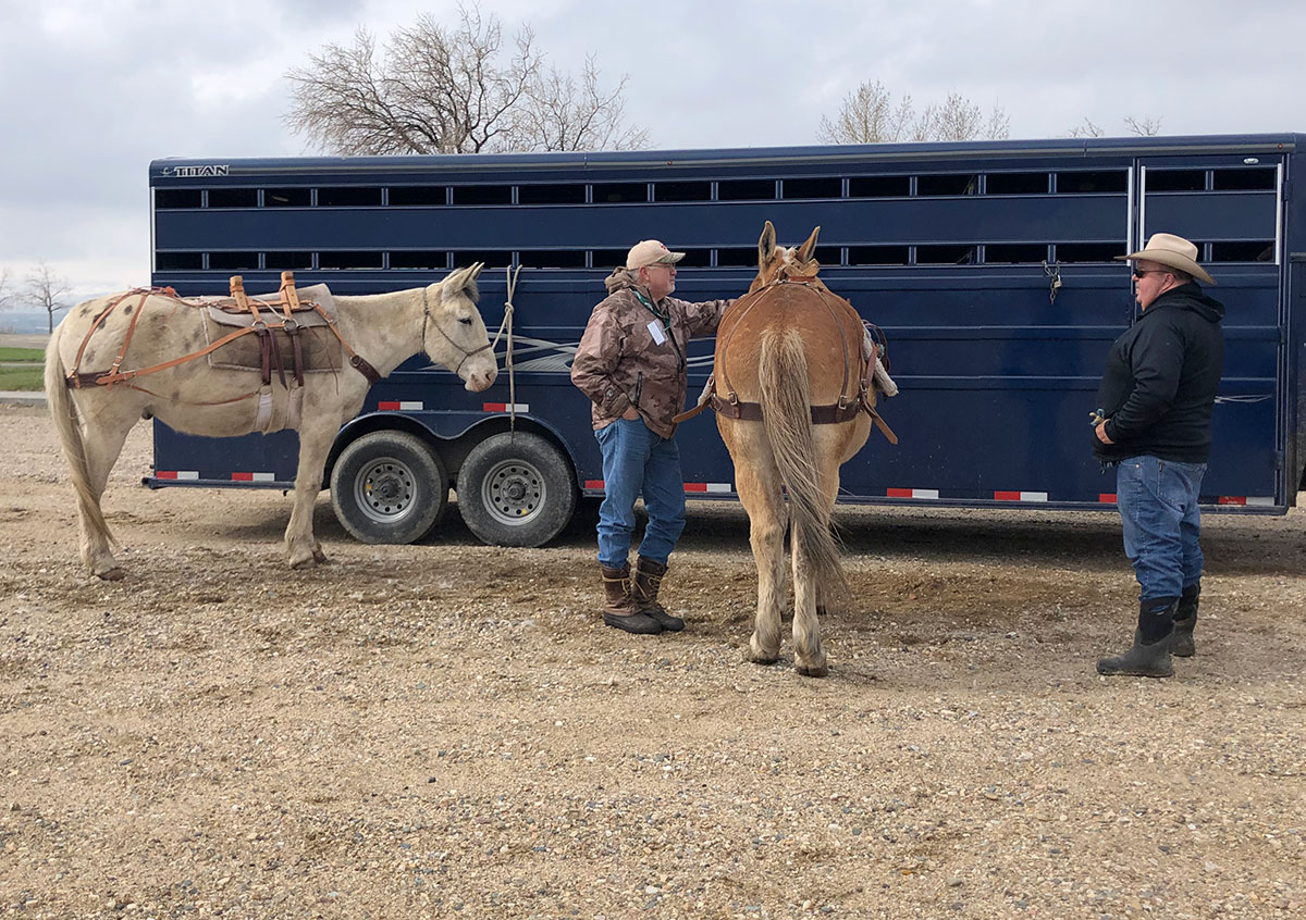 Sy Gilliland,Todd Stevie, and Sid and Woodrow at the 2019 Wyoming Game and Fish Expo