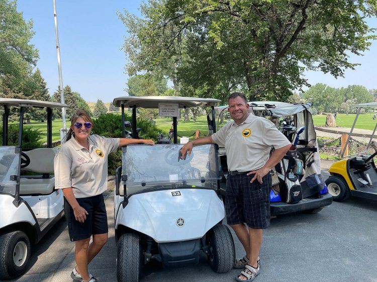 Laure and Hank Laurie and Hank Alexander golf for WYOGA at the Golf for Wildlife Tournament in Buffalo, Wyoming
